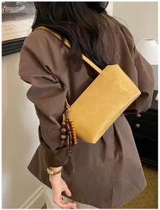 Bolso de hombro vintage de color sólido bajo el brazo con abalorio de cuentas para mujer moda.