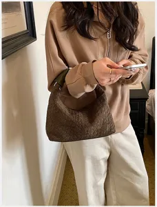 Bolso de mano de cuero trenzado elegante francés para mujer, bolso de hombro minimalista.