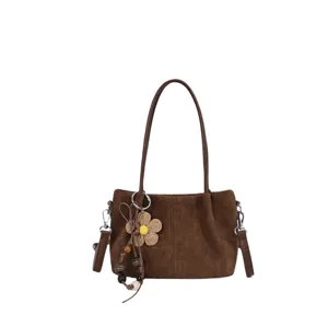 Brown suede shoulder bag for women, casual crossbody purse with cute flower charm and wooden beads.