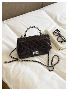 Borsa a tracolla trapuntata da donna, elegante borsetta con catena per uso quotidiano.