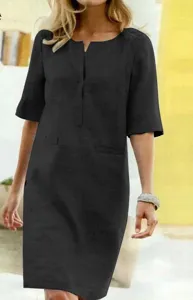 Black short sleeve linen dress detail showcasing V neck design and casual comfort style.