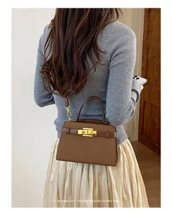 Women retro solid color crossbody bag, chic minimalist top handle shoulder bag for daily use.