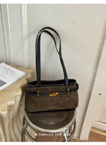 Vintage bruine suède schoudertas voor dames, chique pendel PU lederen tote met metalen slot.