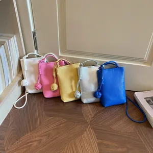 Borsa a tracolla minimalista monocolore da donna, mini borsa per cellulare in pelle con manico a nodo.