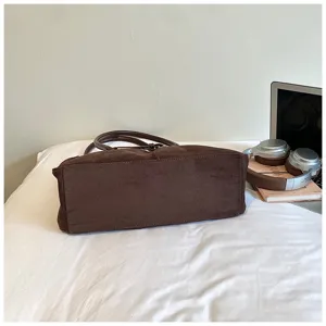 Dark brown suede tote bag detail view, casual large capacity shoulder bag for women daily commute.