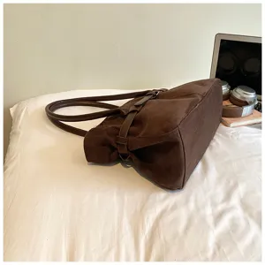 Brown suede shoulder tote bag for women, stylish vintage commuter bag with large capacity.