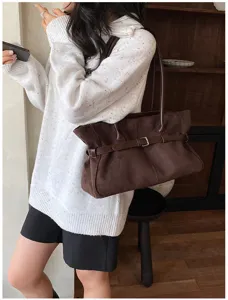 Brown suede tote bag for women, chic autumn commuter shoulder bag with retro belt design.