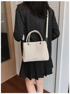 Bolso tipo cubo de lona informal, elegante bolso de hombro para mujer de moda.
