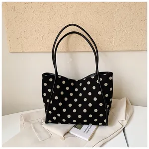 Vue détaillée du sac cabas à pois en toile noire, grande capacité et style quotidien.
