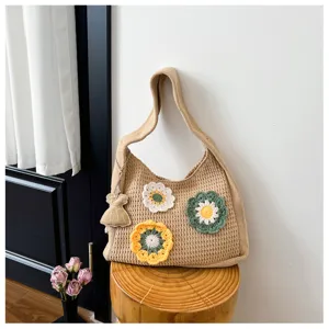 Women knit shoulder bag with cute crochet flowers, casual summer hollow tote handbag.