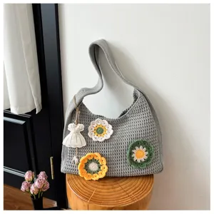 Grey crochet hollow shoulder bag with floral patches and dress pendant, Korean style tote.