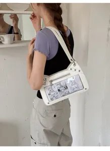 Detailansicht der stilvollen weißen Achsel-Itatasche mit transparentem Manga-Anzeigefenster.