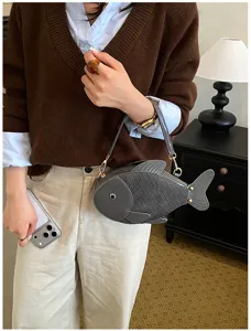 Cute fish shaped crossbody bag for women, unique grey PU leather shoulder bag detailed.