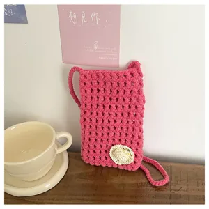 Handgefertigte rosa Häkel Handytasche Detail, hohle Strick Umhängetasche mit Blütendekor.