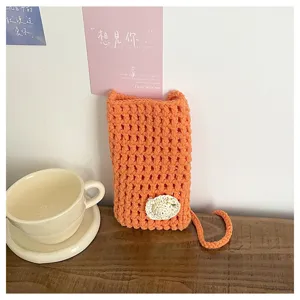 Handgemachte gehäkelte hohle Handytasche, leichte Sommer Mini-Umhängetasche mit süßem Dekor.