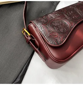 Burgundy embossed retro shoulder bag, chic floral carved crossbody bag for women detail view