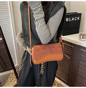 Chic brown tooled leather crossbody shoulder bag for women, stylish French niche square bag.