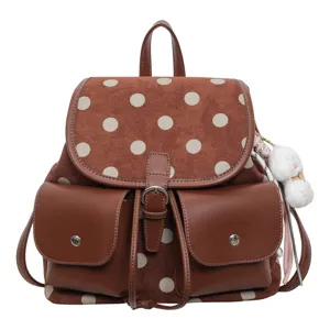 Korean style polka dot backpack for women, large capacity casual commuter school bag with pockets.