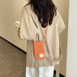 Handgefertigte gehäkelte Handytasche, leichte und sehr schicke Sommertasche für Damen.