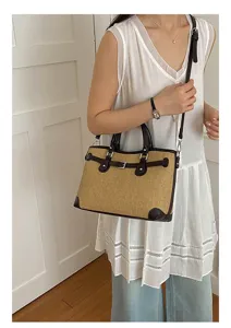 Korean style straw handbag for women, casual summer commuter shoulder bag with buckle detail.