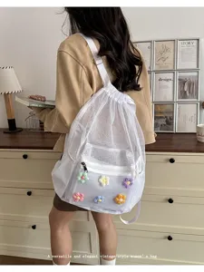 Korean ins style hollow mesh backpack with cute crochet flowers, casual vintage drawstring student book bag.