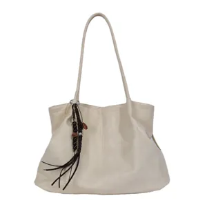 Minimalist beige leather tote bag with tassel charm, large capacity women shoulder bag.