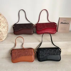 French vintage style embossed leather shoulder bag set in stylish multiple colors.
