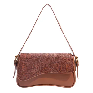Vintage brown embossed leather shoulder bag for women, elegant chic crossbody bag.
