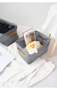 Thickened fabric storage basket with leather handles, ideal for wardrobe and clothes organization.
