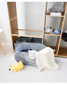 Detail view of the portable collapsible mesh laundry basket showcasing storage capacity.