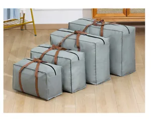 Borsa portaoggetti in tessuto pieghevole con manici marroni per coperte e vestiti.