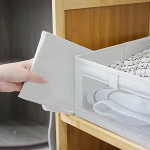 Caja de almacenamiento de lino y algodón con ventana de malla transparente para ropa.