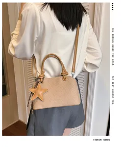 Koreanische Schick Handtasche für Damen, lässige Schultertasche mit Sternanhänger für Alltag.
