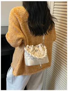 Women fashion minimalist crossbody bucket shoulder bag, casual white quilted leather handbag.