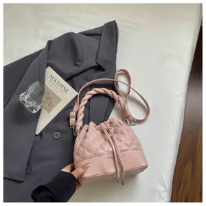 Pink quilted bucket bag with braided handle and drawstring closure for women daily commuting