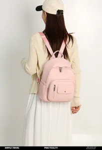 Elegante zaino in pelle rosa da donna, borsa da viaggio casual e pratica borsa scolastica.