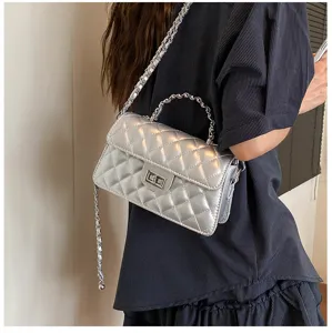 Silver quilted chain shoulder bag, stylish women crossbody handbag with turn lock closure.