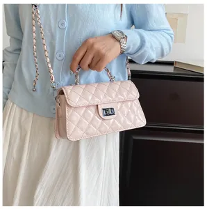 Pink quilted chain shoulder bag for women, elegant small square crossbody bag with turn lock.