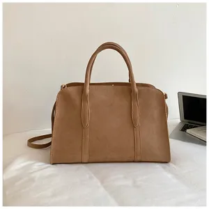 Retro brown suede Boston handbag, large capacity shoulder messenger bag for women stylish daily use.