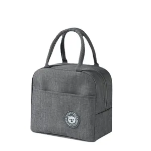Grey insulated lunch bag with durable handles, front pocket and thermal lining for daily meals.