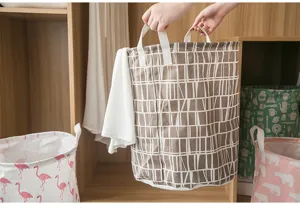 Opvouwbare katoenen linnen wasmand met geometrisch patroon voor kleding en opbergen.