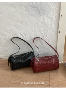 Stilvolle gewebte zylindrische Damentasche, elegante lässige Umhängetasche in Schwarz und Rot.