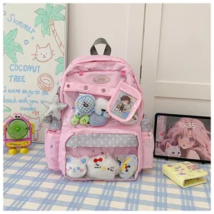 Mochila escolar rosa bonita gran capacidad ita bag con bolsillo transparente y peluches.
