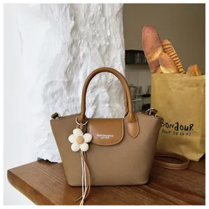 Korean niche design canvas and PU leather handbag, stylish casual women's dumpling tote bag.