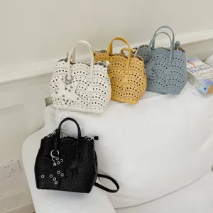 Borsa a secchiello traforata chic con ciondolo a stella elegante borsa a tracolla