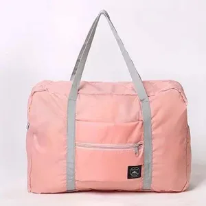 Large foldable travel duffel bag with luggage sleeve, pink waterproof storage bag for travel.