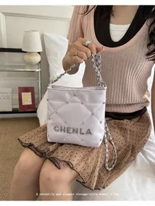 Trendy purple quilted shoulder bag with rhinestones and chain strap for women summer fashion style
