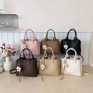 Bolso de hombro minimalista elegante para mujer con colgante de flor, bolso casual colorido