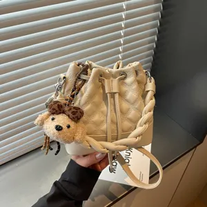 Women Plaid PU Leather Bucket Bag Minimalist Crossbody Shoulder Bag Woven Handle Drawstring Commuter Purse Optional Plush Charm