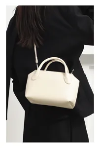 Minimalist cream bowling shoulder bag, retro commute top-handle crossbody bag for women.
